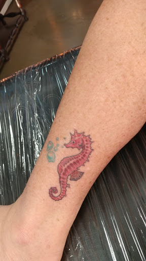 Find meaningful mother tattoo ideas for your next unique tattoo in Lakeland at Holy Grail Tattoo