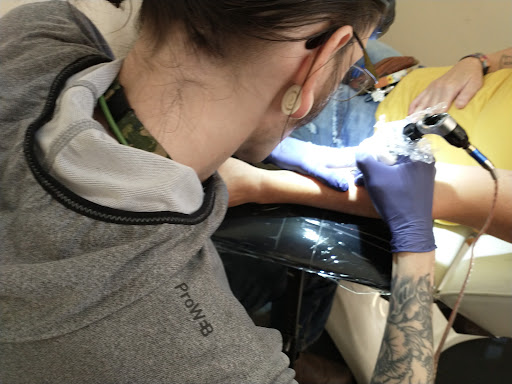 Explore biblical tattoo ideas for men, creative tattoo ideas in Victor, available at Rite of Passage Tattoo Inc