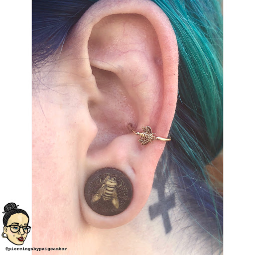 Explore walk in tattoo ideas, creative tattoo ideas in Oshkosh, available at Piercings by Paige at Big Guns Tattoo
