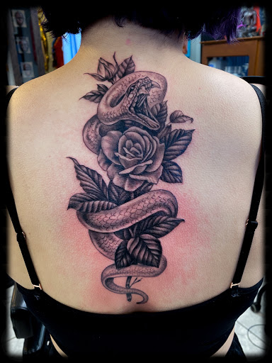 Explore street signs tattoo ideas, creative tattoo ideas in Enid, available at Culture Tattoo