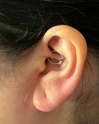 Explore under knee tattoo ideas, creative tattoo ideas in Milwaukee, available at Beauty is Pain Tattoo and Body Piercings