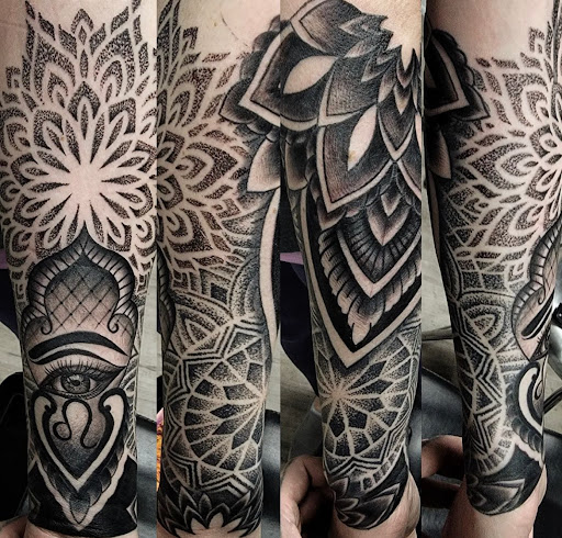 Explore large flower tattoo ideas, creative tattoo ideas in Kenosha, available at Kenosha Tattoo Company