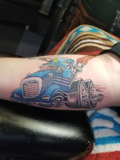 Explore foot tattoo ideas for men, creative tattoo ideas in Rochester, available at Marks Immortal Ink Tattoos