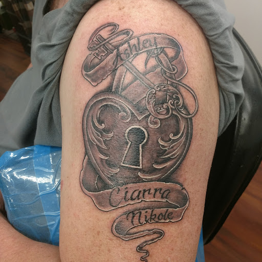 Explore female wonder woman tattoo ideas, creative tattoo ideas in Cedar Springs, available at Americas Renegade Tattoo Society