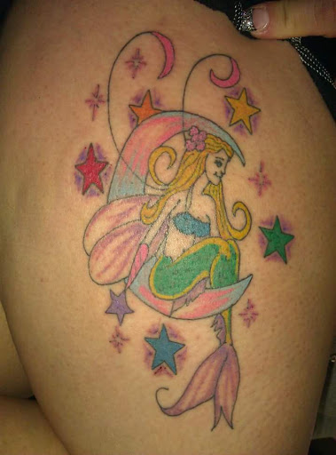 Explore cute cross tattoo ideas, creative tattoo ideas in Overland Park, available at Inkslingers Tattoo Studio