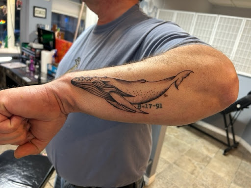 Explore fern tattoo ideas, creative tattoo ideas in Nashua, available at Mayhem Ink Tattoo