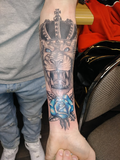 Explore wrist butterfly tattoo ideas, creative tattoo ideas in Niles, available at Paparazzi Tattooz & Body Piercings