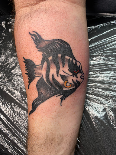 Explore cool cross tattoo ideas, creative tattoo ideas in Zephyrhills, available at Lions Den Tattoo Company