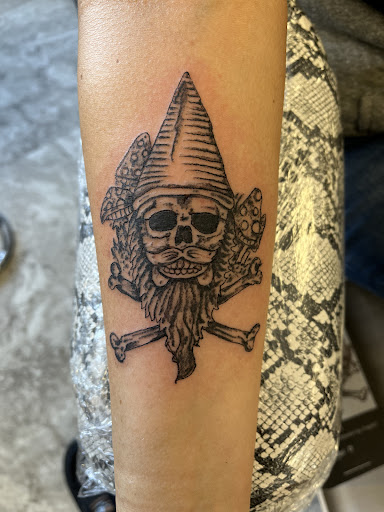 Find wolf tattoo idea for your next unique tattoo in Seymour at American Gypsy Tattoo Corp.