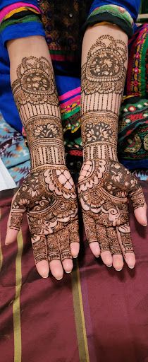 Find clock tattoo ideas for your next unique tattoo in Concord at Naseera Fazil Henna Art