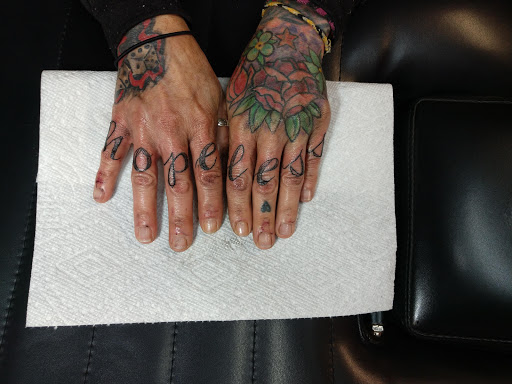 Explore skull tattoo ideas for women, creative tattoo ideas in Tallmadge, available at Kustom Culture