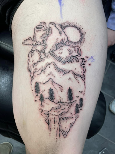Explore small thigh tattoo ideas, creative tattoo ideas in Rapid City, available at Torch Lake Ink