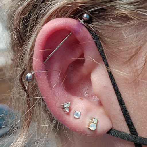 Explore men's inner bicep tattoo ideas, creative tattoo ideas in San Marcos, available at Ollie the Impaler Body Piercing