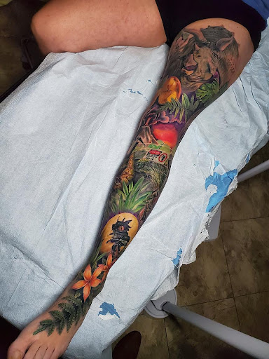 Explore om tattoo ideas, creative tattoo ideas in Tea, available at Red Arbor Tattoo