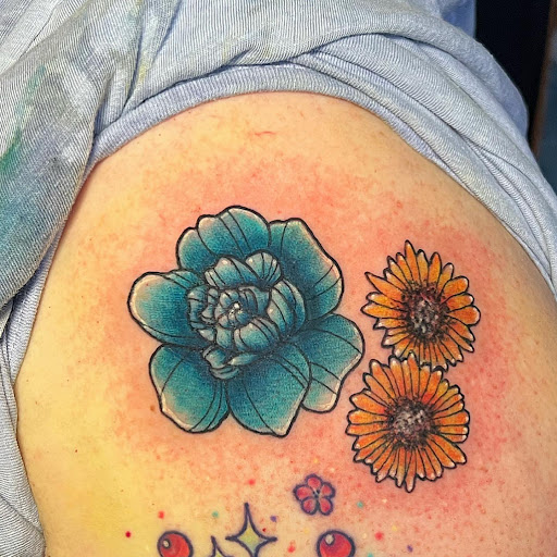 Explore solid black tattoo ideas, creative tattoo ideas in Saint Paul, available at Black Coffin Tattoo