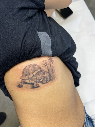 Explore men's dark tattoo ideas, creative tattoo ideas in Inglewood, available at Droopys tattoo shop