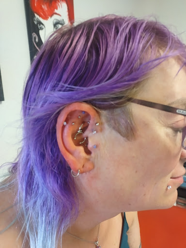 Explore dog paw tattoo ideas, creative tattoo ideas in Richland, available at Poker Face Piercing