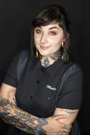 Explore upper chest tattoo ideas, creative tattoo ideas in Oshkosh, available at Piercings by Molly Moon at 920 Tattoo and Piercing