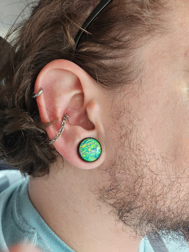 Explore undertaker tattoo ideas, creative tattoo ideas in Worcester, available at Elegance Piercing & Tattoo Inc.