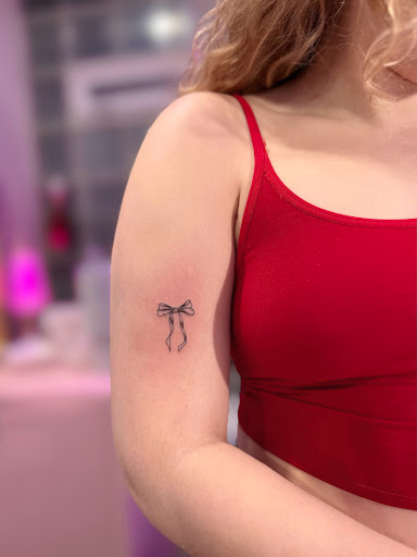 Explore magnolia tattoo ideas, creative tattoo ideas in Chicago, available at Crispy Aura Fine Line Tattoos