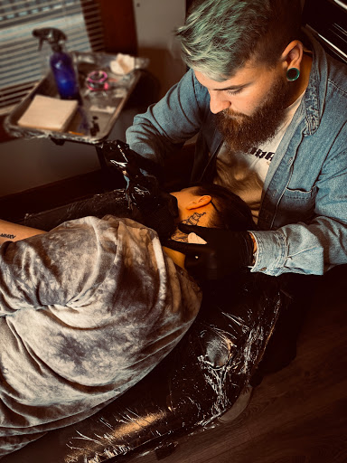 Explore kingfisher tattoo ideas, creative tattoo ideas in Warrensburg, available at Altered Visions Tattoo Studio