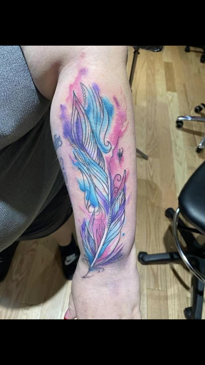 Explore mental health ribbon tattoo ideas, creative tattoo ideas in Morrisville, available at Sinners Circle tattoo co.