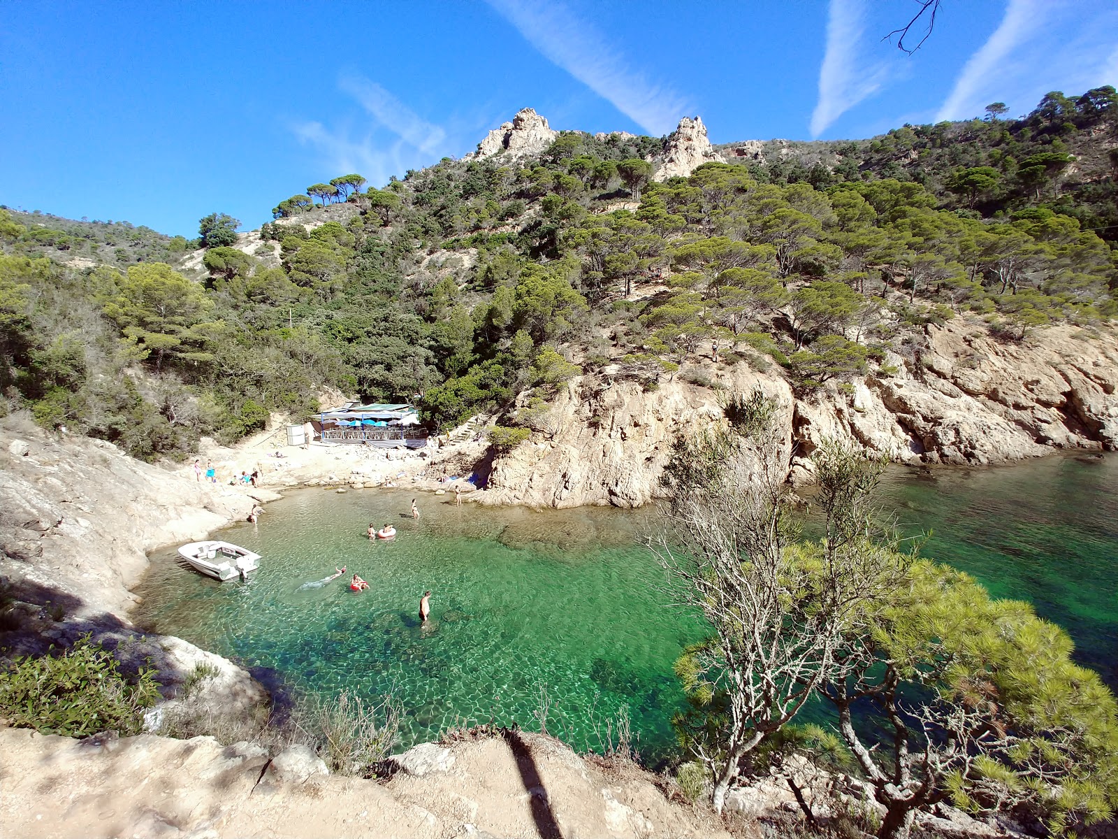 Photo of Cala Bona with rocks cover surface