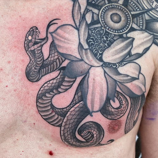 Explore star tattoo sleeve ideas, creative tattoo ideas in Erie, available at Wayward Tattoo Studio