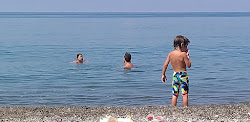 Ozluce Beach'in fotoğrafı düz ve uzun ile birlikte