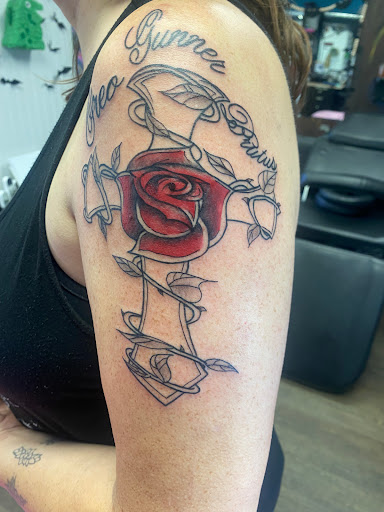 Explore tattoo ideas for women's wrist, creative tattoo ideas in Lake City, available at Crooked Spines Tattoo Studio