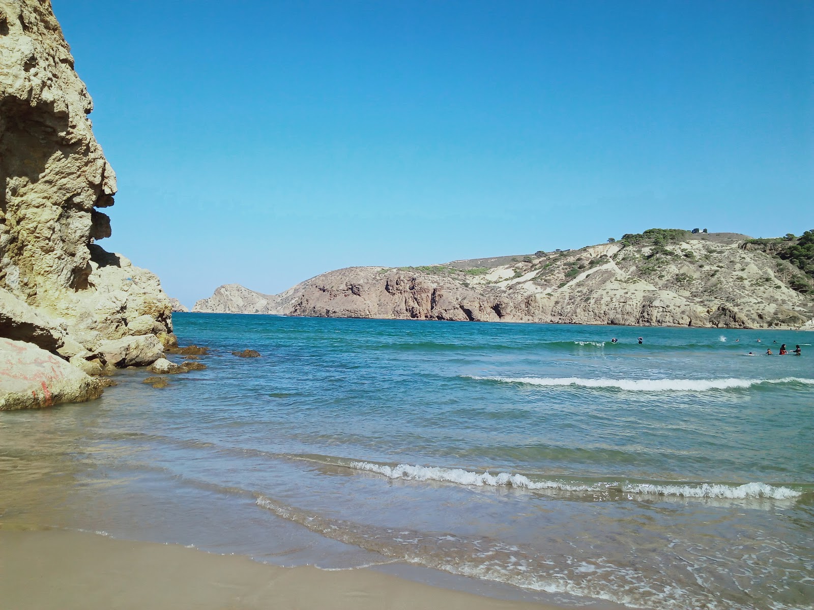 Foto von Moscarda beach und seine wunderschöne Landschaft