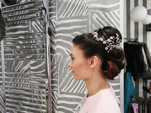 Información y opiniones sobre Peluquería Rosa Blanco de León