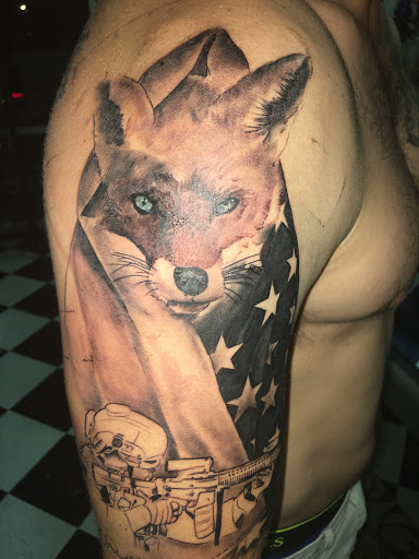 Find angel tattoo ideas for guys for your next unique tattoo in Savannah at Tatlyfe Studios