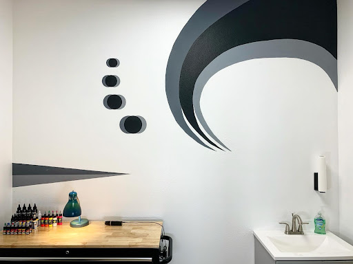 Explore rose foot tattoo ideas, creative tattoo ideas in Carson City, available at Odyssey Tattoo