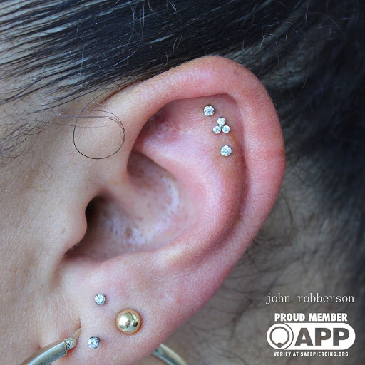 Explore neon tattoo ideas, creative tattoo ideas in Fort Myers, available at Tiger Lotus Tattoo and Piercing