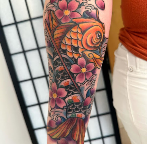 Explore flower half sleeve tattoo ideas, creative tattoo ideas in Valparaiso, available at Early Bird Tattoo Company