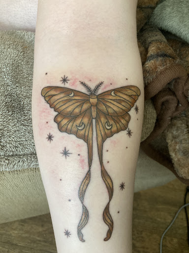 Explore skiing tattoo ideas, creative tattoo ideas in Auburn, available at The Creative Edge Tattoo & Body Piercing