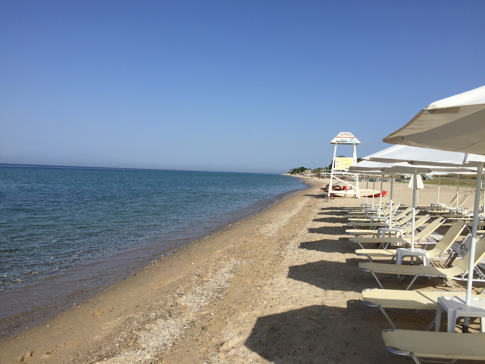 Foto di Geoponika beach con costa lunga e dritta