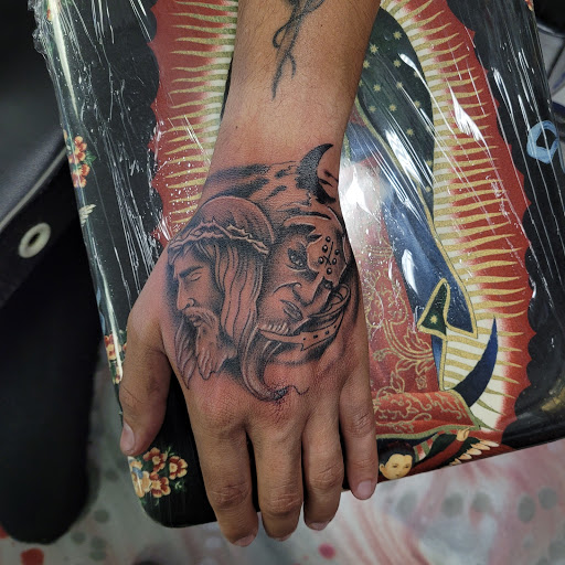 Explore love is pain tattoo ideas, creative tattoo ideas in Tucson, available at Jesses Tattoos & Tattoo Supplies