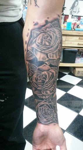 Explore throat tattoo ideas for females, creative tattoo ideas in Tucson, available at Tattoo Azteca Inc