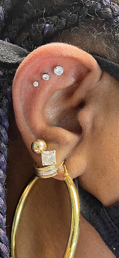 Explore fallen angel tattoo ideas, creative tattoo ideas in Bay Shore, available at Piercings By Dean 95