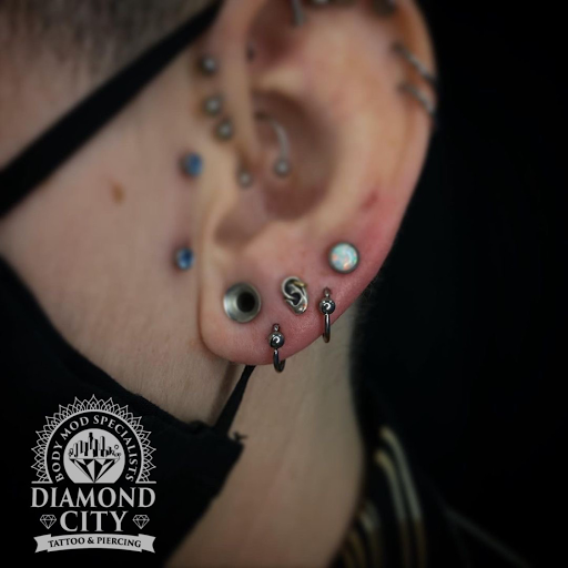 Find tattoo ideas for tummy tuck scars for your next unique tattoo in Murrieta at Diamond City Tattoo & Piercing