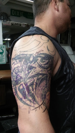 Explore women's back tattoo ideas, creative tattoo ideas in Big Spring, available at A Mom & Pop Tattoo Shop