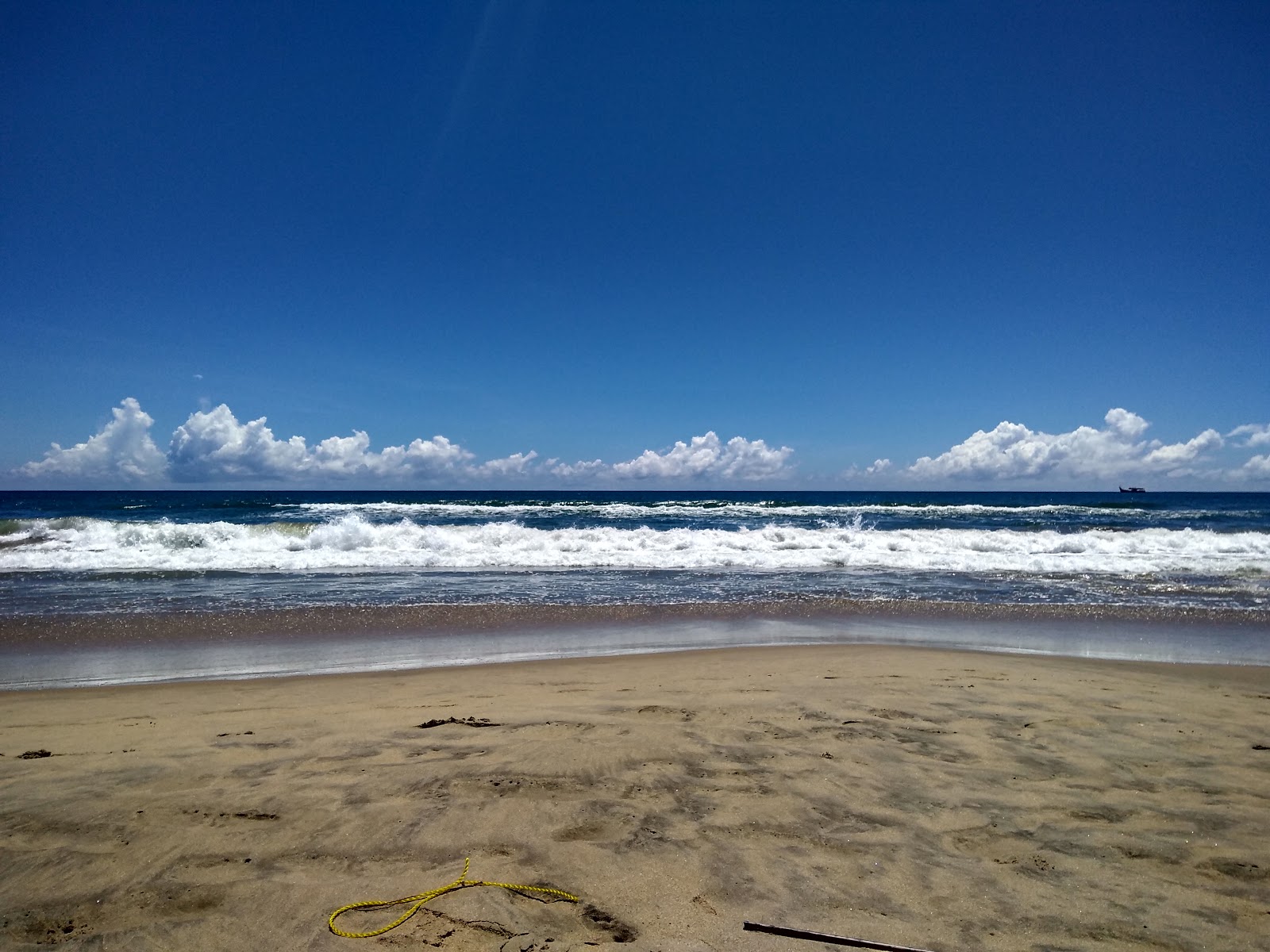 Valokuva Pudukuppam Beachista. - suosittu paikka rentoutumisen tuntijoille