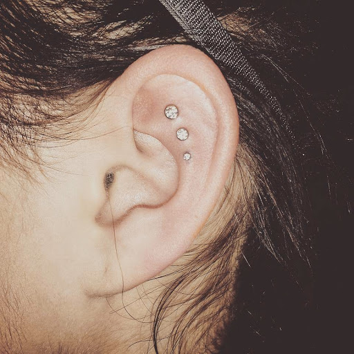 Explore 2001 tattoo ideas, creative tattoo ideas in Olympia, available at Metro Body Piercing