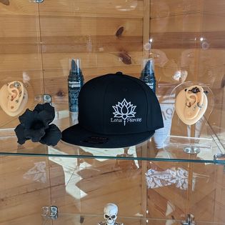 Explore knowledge tattoo ideas, creative tattoo ideas in Minocqua, available at Lotus Piercing