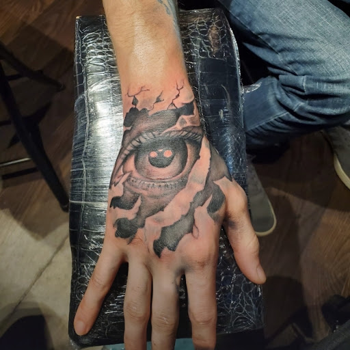 Explore dark romance tattoo ideas, creative tattoo ideas in Maryville, available at Distinked Tattoo