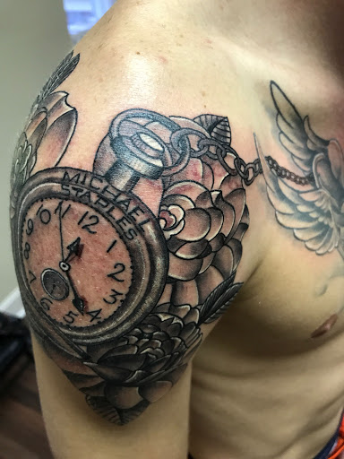 Explore lower back tattoo ideas for men, creative tattoo ideas in Wake Forest, available at Revelation Ink Tattoo and Piercing