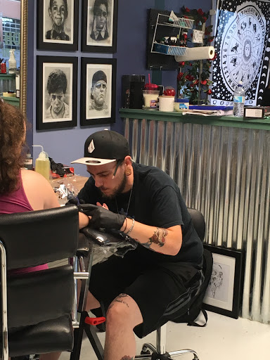 Explore pansy tattoo ideas, creative tattoo ideas in Kent, available at War Horse Ink