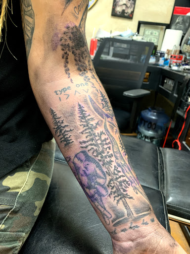 Explore hammer tattoo ideas, creative tattoo ideas in Garden City, available at Talon Tattoo Co